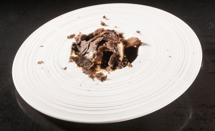 Timballo di pasta con spugnole, foie gras e tartufo nero