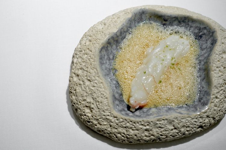 Chargrilled scampi with cream of artemisia, vanilla oil, foam of noisette butter