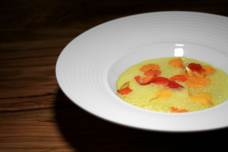 Flowers of nasturtium, seafood ragout. Emulsion of petals of nasturtium, mangetout, "Mediterranean" seafood ragout (king prawns from Sanremo, baby calamari from Villefranche-sur-Mer, shellfish)